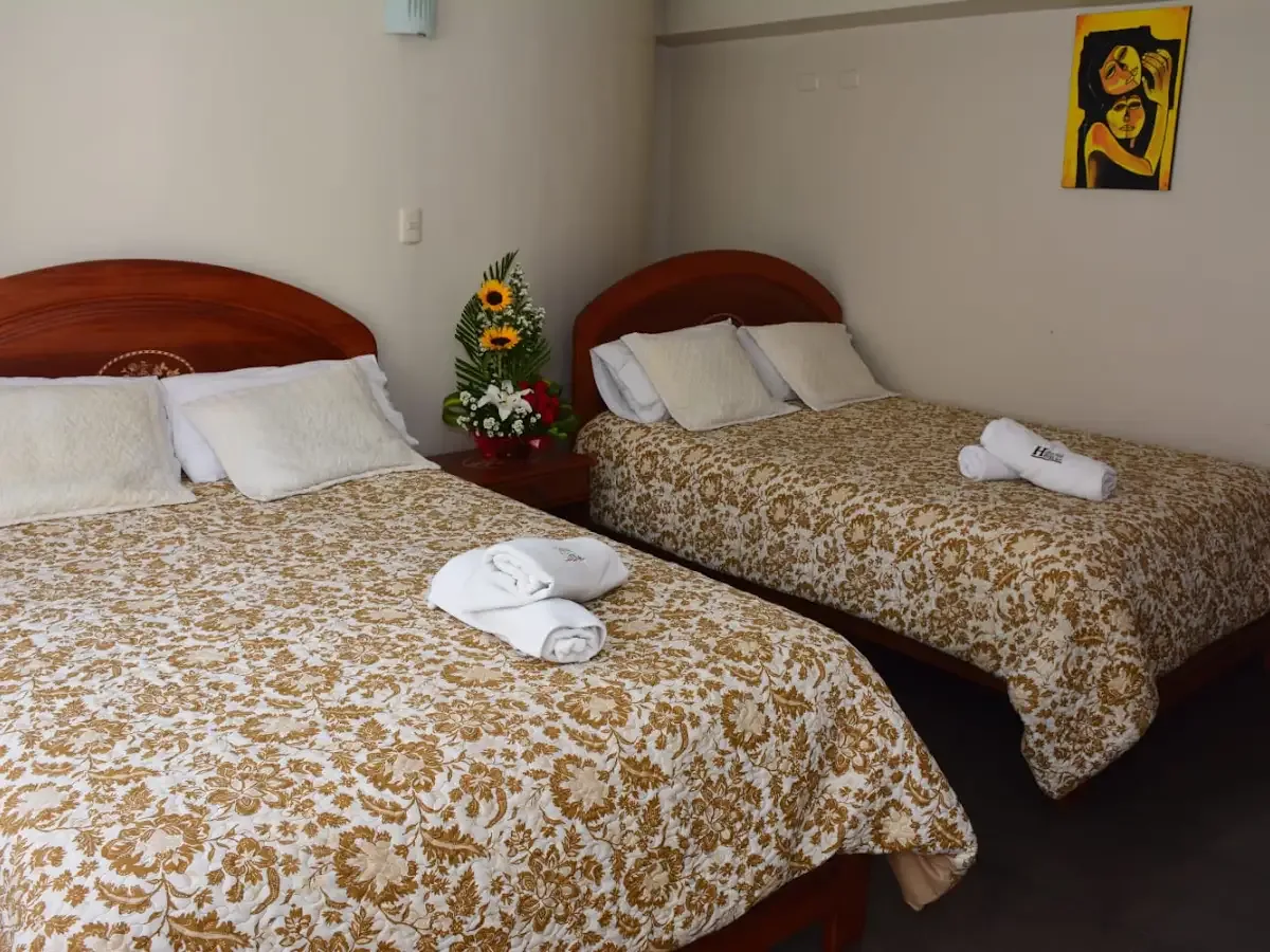 Habitación triple del Hotel Elvita Spa